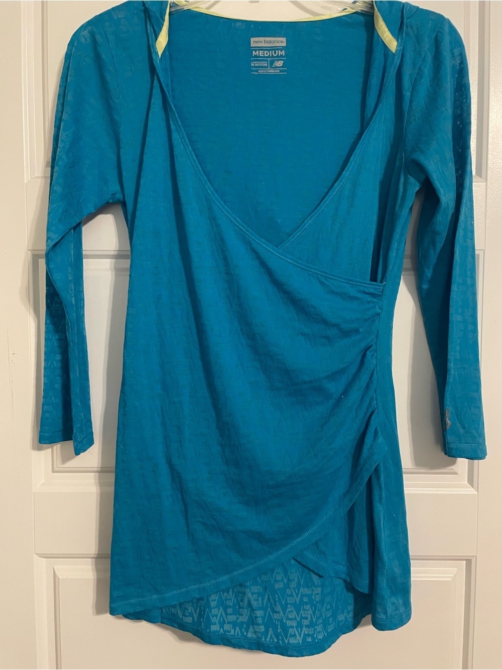 New Balance - Teal Active Wear Hooded, 3/4” sleeve with fitted fabric wrap